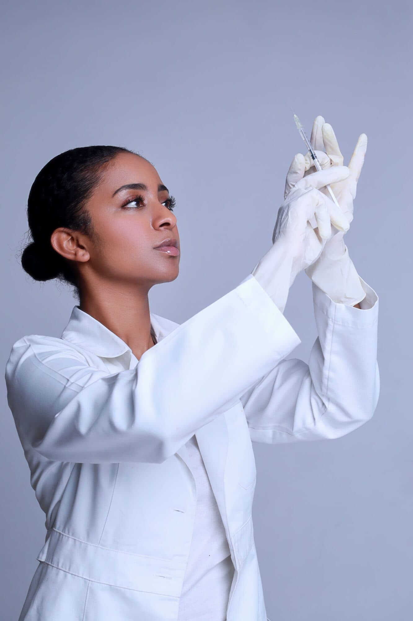 A clinician preparing a treatment